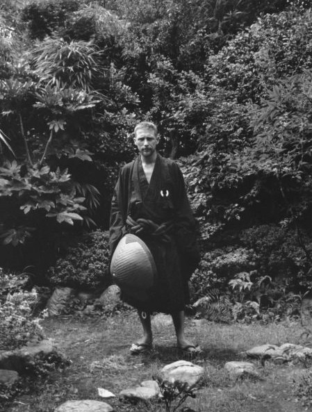 Gary Snyder in his small house-garden on Nishinomiya-cho, Kita-ku section near Dai-Tokuji Temple, Kyoto, Japan July 1963.